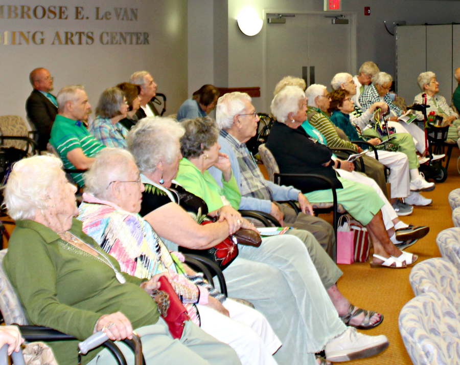 residents sitting learning about conservation