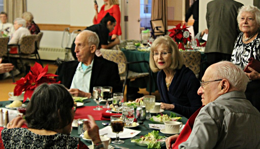 2 couples at Holiday dining table
