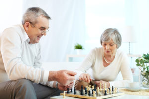 Older adults playing cognitive games